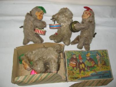 Appraisal: A German three piece monkey band fur covered card and