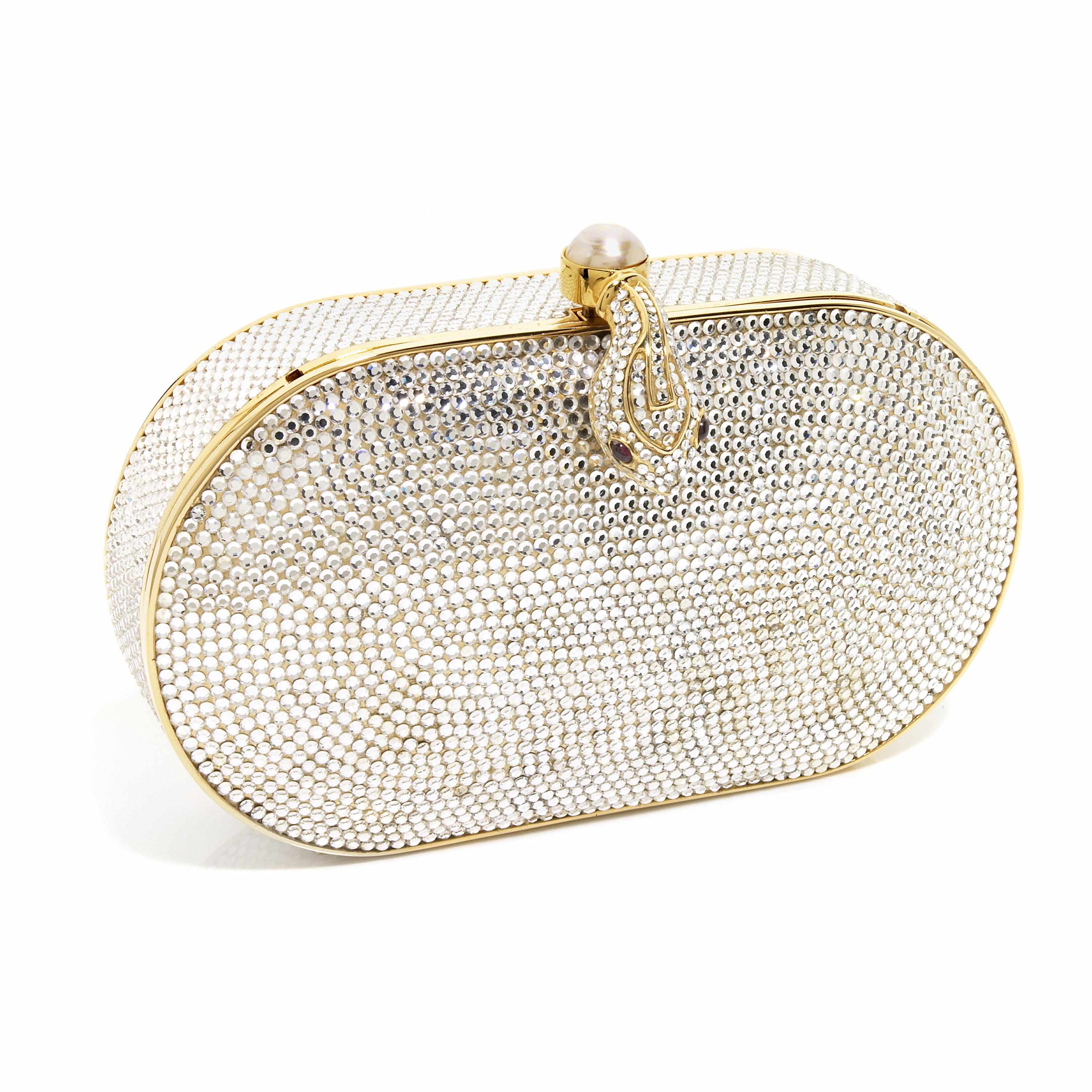 Appraisal: An oval silver crystal purse with a snakehead and simulated