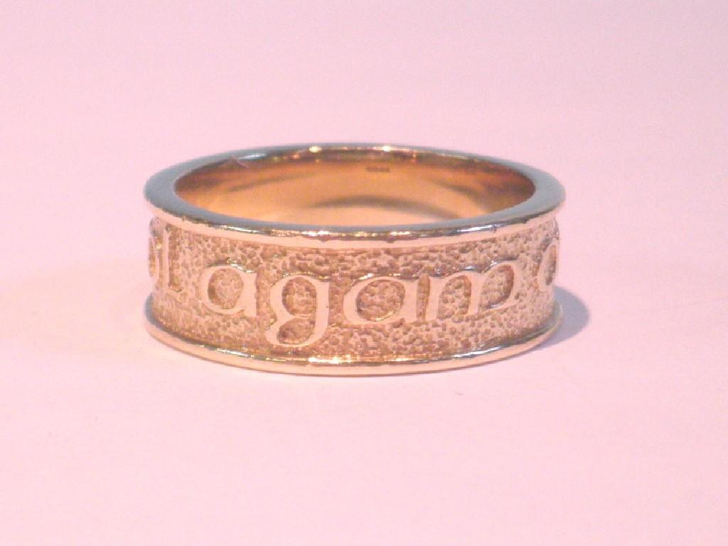 Appraisal: A ct gold wedding band with Celtic inscription g