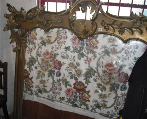 Appraisal: A rococo style carved giltwood overmantle mirror adapted as a