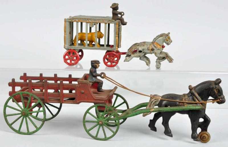 Appraisal: Lot of Cast Iron Horse-Drawn Toys Description American Includes Kenton