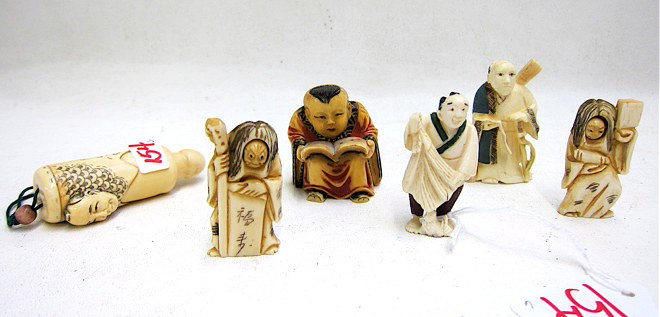 Appraisal: CHINESE JAPANESE NETSUKE six pieces featuring ivory and ivory-like standing