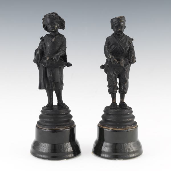 Appraisal: TWO PATINATED SPELTER CABINET SCULPTURES One of a young boy