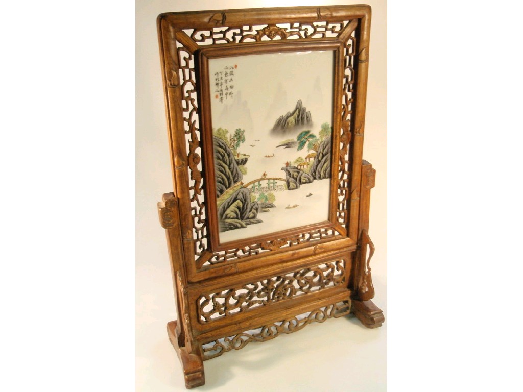 Appraisal: A Chinese hand painted porcelain plaque in a hardwood frame