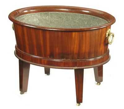 Appraisal: An early th century mahogany wine cooler with an everted