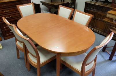 Appraisal: Modern dinning table and six matching chairs