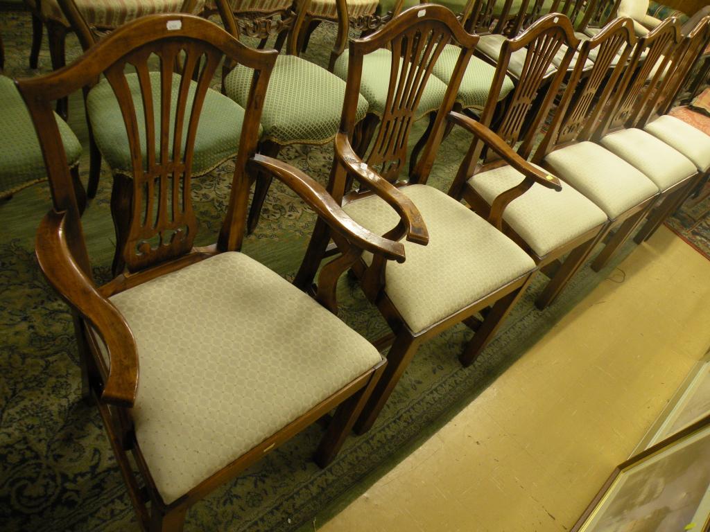 Appraisal: A set of six fruitwood dining chairs in country chippendale