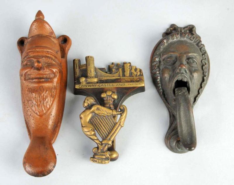 Appraisal: Lot of Cast Brass Figural Doorknockers Description English Condition Excellent