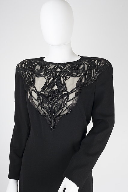 Appraisal: An Alexander McQueen black evening dress with lace bead and