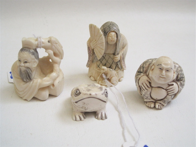 Appraisal: FOUR IVORY HAND CARVED NETSUKE seated frog woman with fan