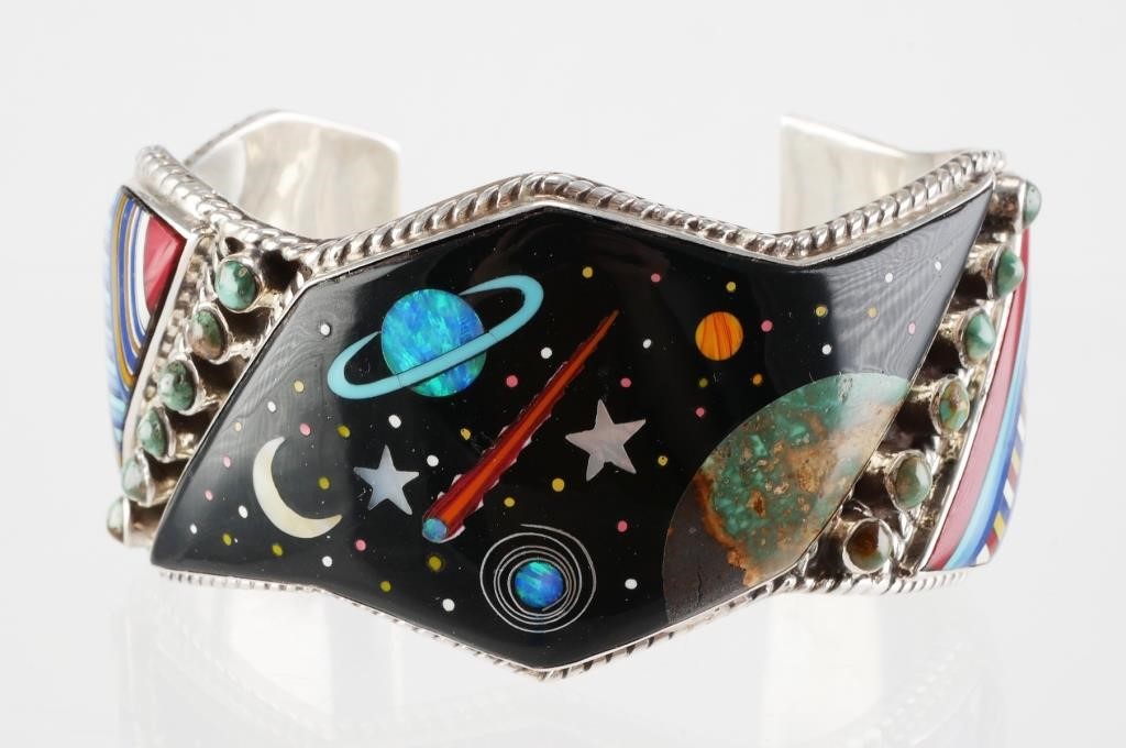 Appraisal: Sterling silver cuff bracelet featuring Native American style cosmic or