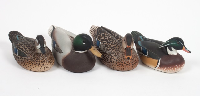 Appraisal: Two pairs of carved wood ducks by Oliver Lawson dated