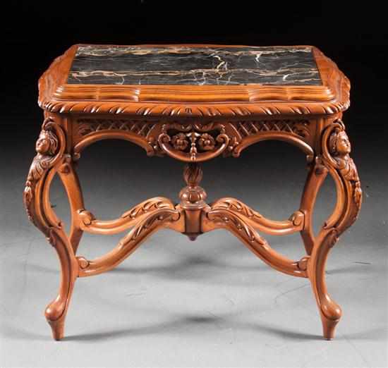 Appraisal: American Rococo Revival style carved walnut side table with inset