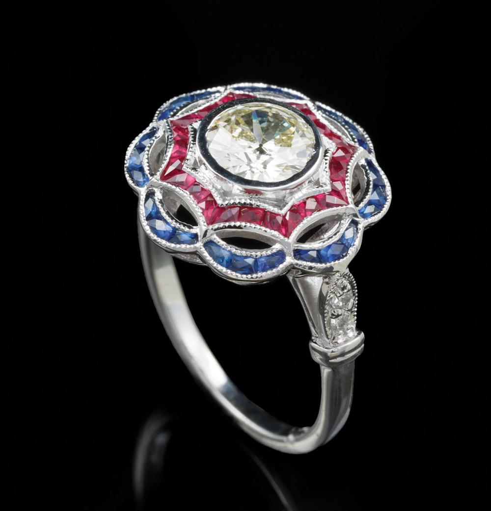 Appraisal: kt White Gold Diamond Sapphire and Ruby Ring center bezel