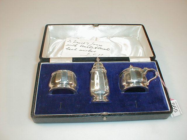 Appraisal: A cased silver three-piece silver cruet by Walker Hall Birmingham