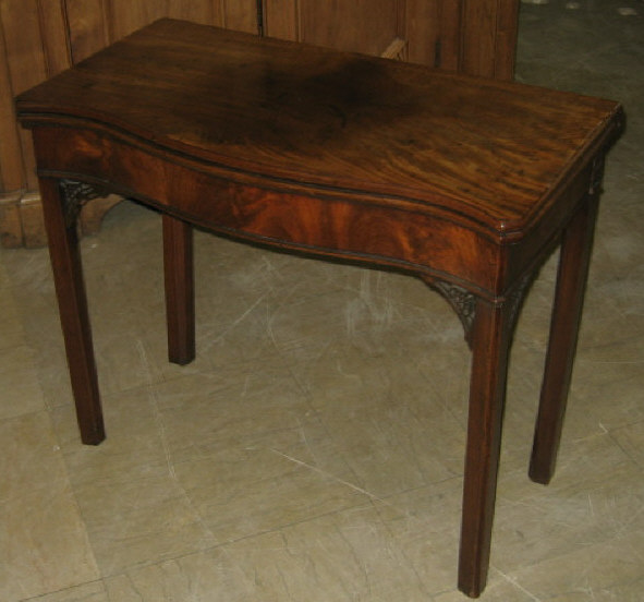 Appraisal: ENGLISH CHIPPENDALE MAHOGANY FLIP-TOP GAMES TABLE Having a hinged serpentine