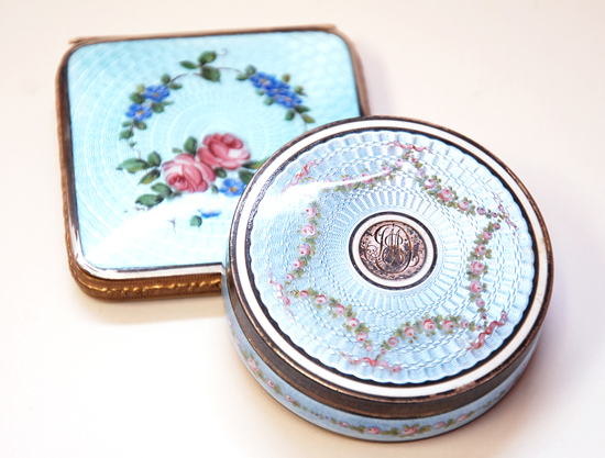 Appraisal: Two Guilloche Enameled Compacts the round one with French sterling