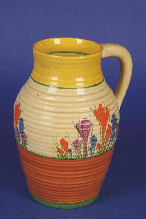 Appraisal: A CLARICE CLIFF BIZARRE ISIS JUG with rib moulded shouldered