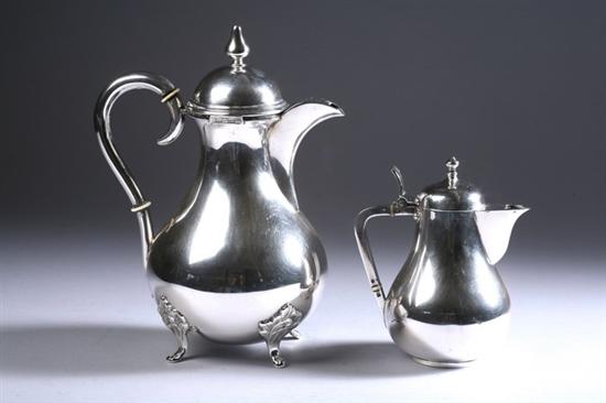 Appraisal: RUSSIAN SILVER CREAMER AND GERMAN SILVER CHOCOLATE POT Vasiform creamer