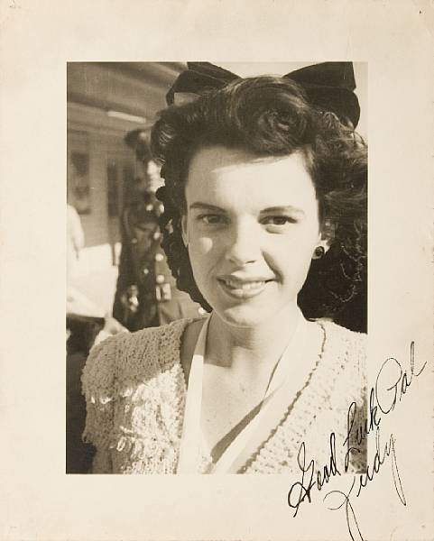 Appraisal: A Judy Garland signed black and white photograph circa A