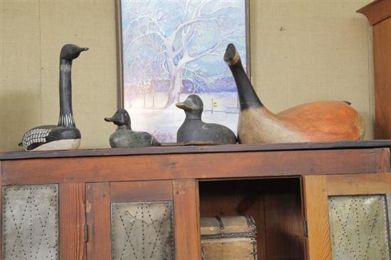 Appraisal: GROUP OF FOUR CARVED AND PAINTED DUCK DECOYS Two duck