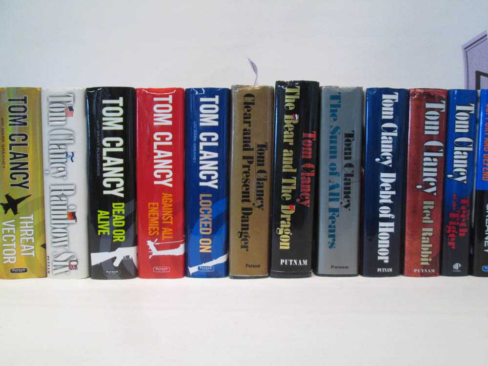 Appraisal: TWELVE HARDBACK TOM CLANCY BOOKS with dust jackets some first