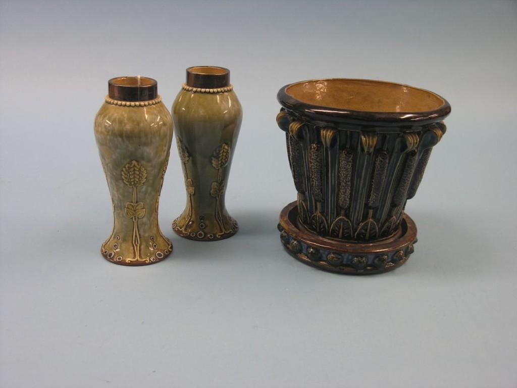 Appraisal: A pair of Royal Doulton glazed stoneware vases baluster-shape with