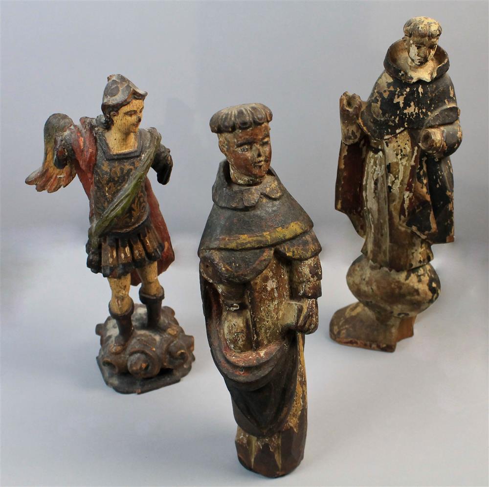 Appraisal: THREE WOODEN SANTOS FIGURES two possibly of Saint Francis and