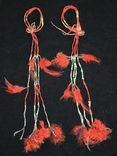 Appraisal: pr of quilled arm bands w cone jangles dyed feathers