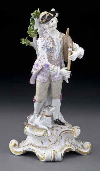 Appraisal: Meissen figure of a man holding a bagpipewith a dog