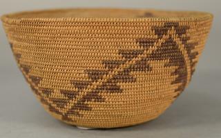 Appraisal: Coiled Indian baskets with geometric designs ht in dia in