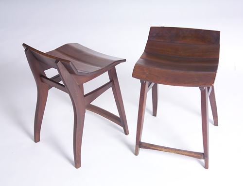 Appraisal: JERE OSGOOD Two walnut stools ca From the original owner