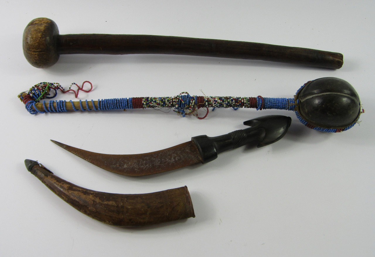 Appraisal: A tribal gourd stick with bound beaded decoration cm long