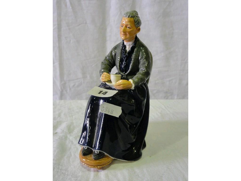 Appraisal: A Royal Doulton figure of 'A Cup of Tea' HN