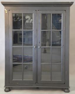 Appraisal: Contemporary two door cabinet with glass doors and wood shelves