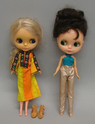 Appraisal: - dolls-platinum blonde and brunette Blonde is wearing the Golden