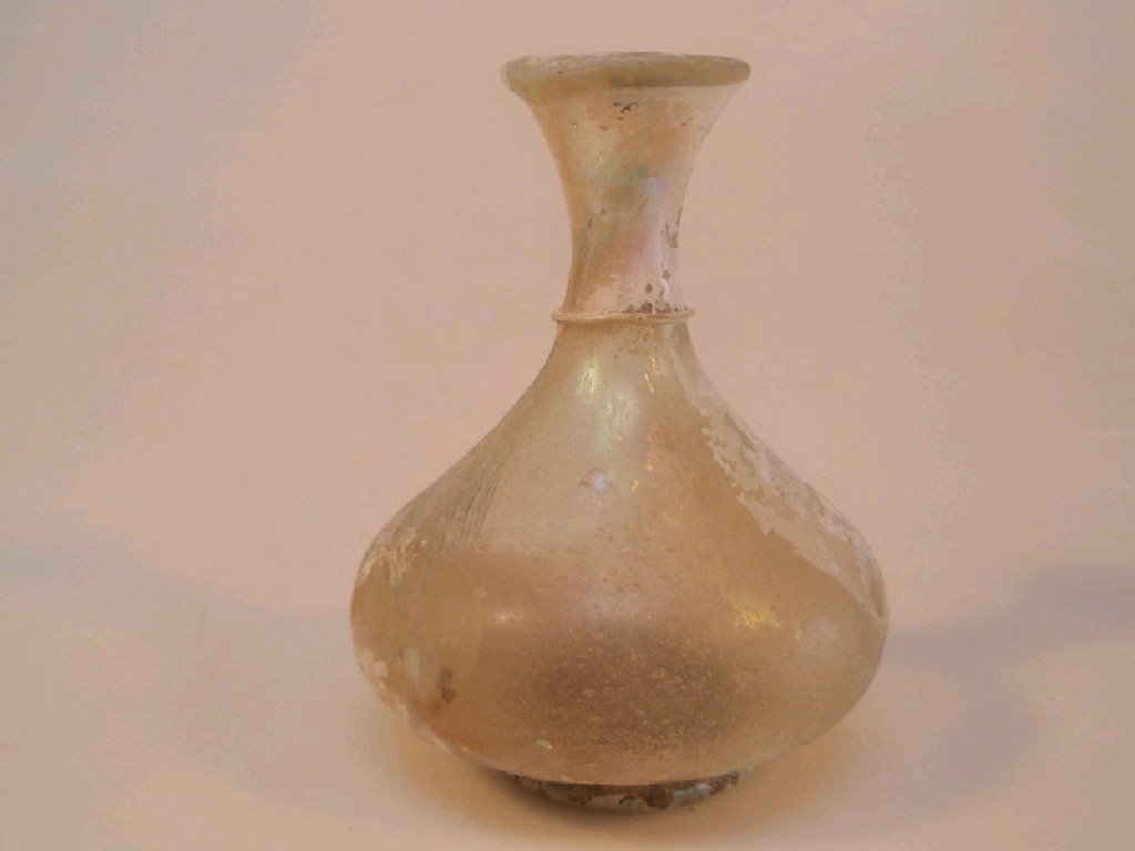 Appraisal: A pale yellowish-green glass flask the funnel neck with a