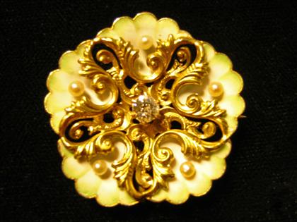 Appraisal: karat yellow gold enamel pearl and diamond flower pinCentral diamond