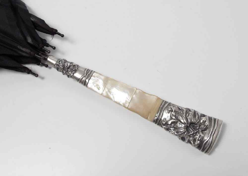 Appraisal: STERLING MOTHER OF PEARL HANDLE PARASOL Art nouveau floral pattern