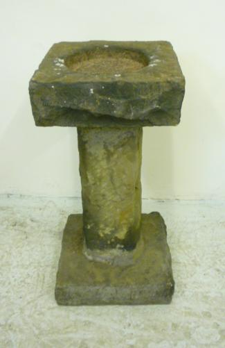 Appraisal: A SANDSTONE BIRDBATH the square stem top with shallow bowl