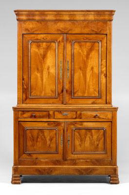 Appraisal: French Provincial fruitwood step back cupboard highly figured bookmatched veneers