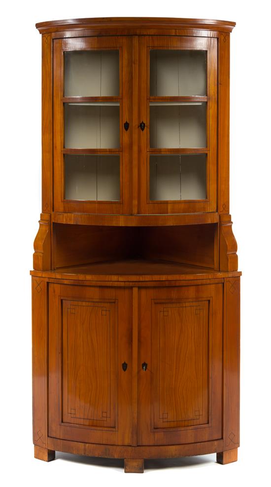 Appraisal: Sale Lot A Biedermeier Fruitwood Corner Cabinet of quarter-round form