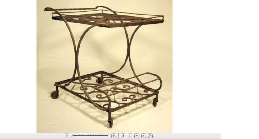 Appraisal: French wrought iron tea trolly The twist rounded handle issues