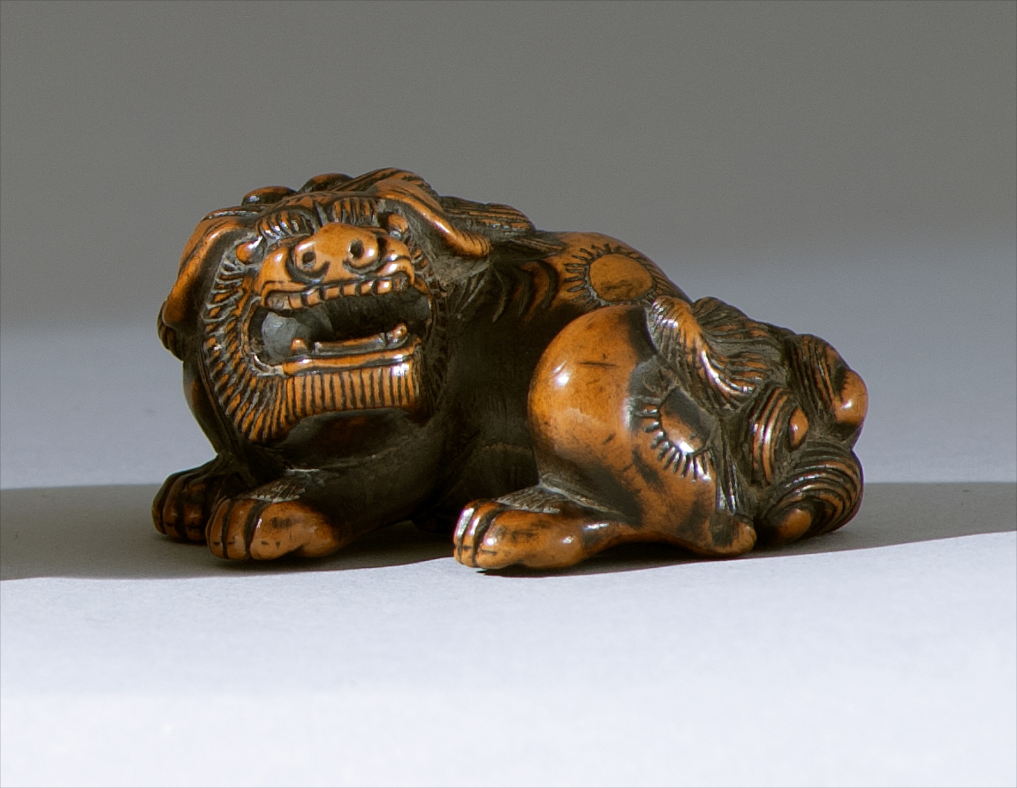 Appraisal: WOOD NETSUKE Early th CenturyIn the form of a crouching