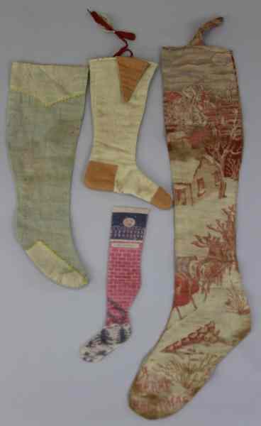 Appraisal: FOUR EARLY CHRISTMAS STOCKINGS Interesting grouping of four early children's