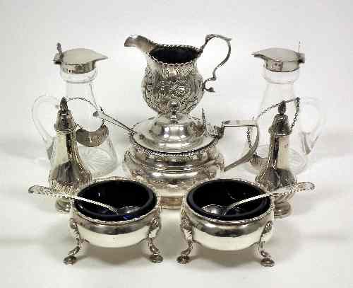 Appraisal: A pair of George III silver circular salts on scroll