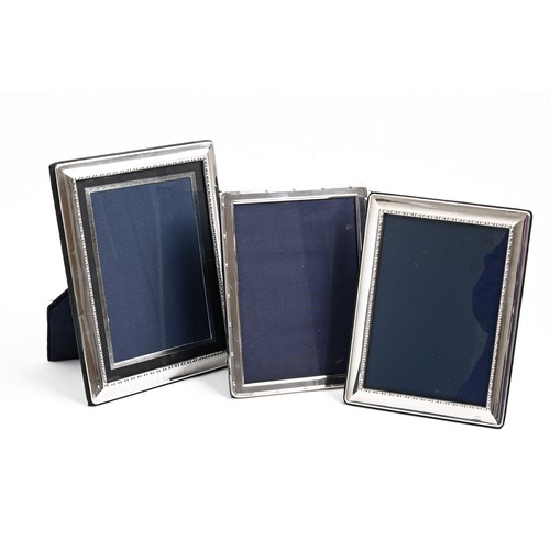 Appraisal: Three Elizabeth II silver photograph frames x cm and smaller