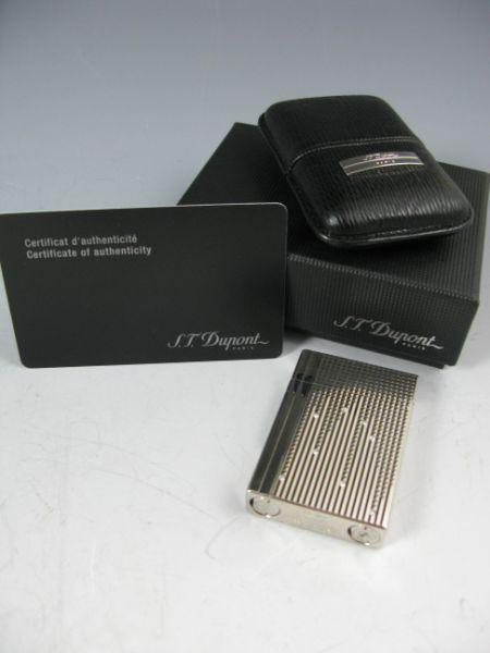 Appraisal: ST Dupont Lighter stamped ST Dupont Paris with original leather