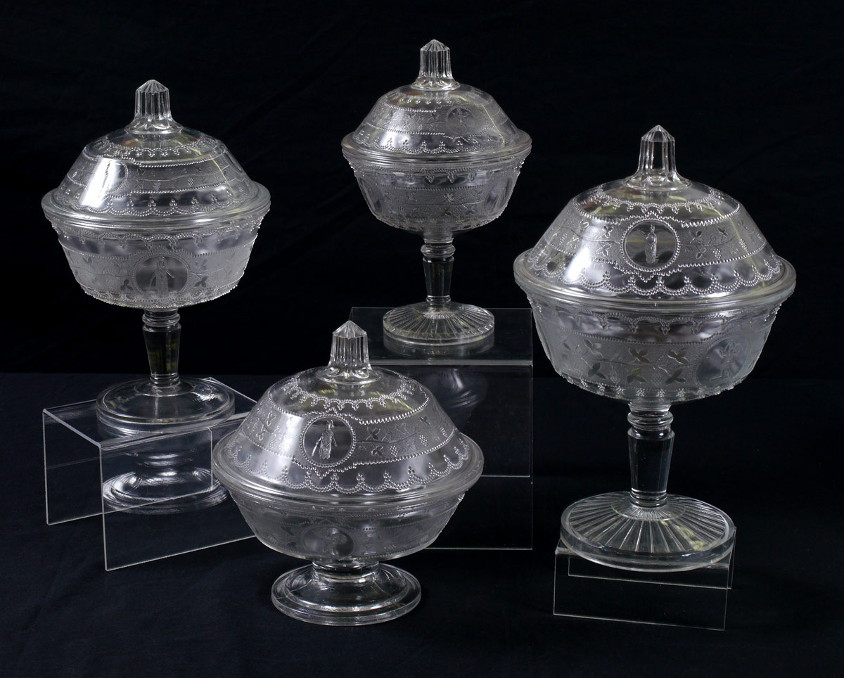 Appraisal: EAPG MINERVA COVERED COMPOTES th C glass compotes in the