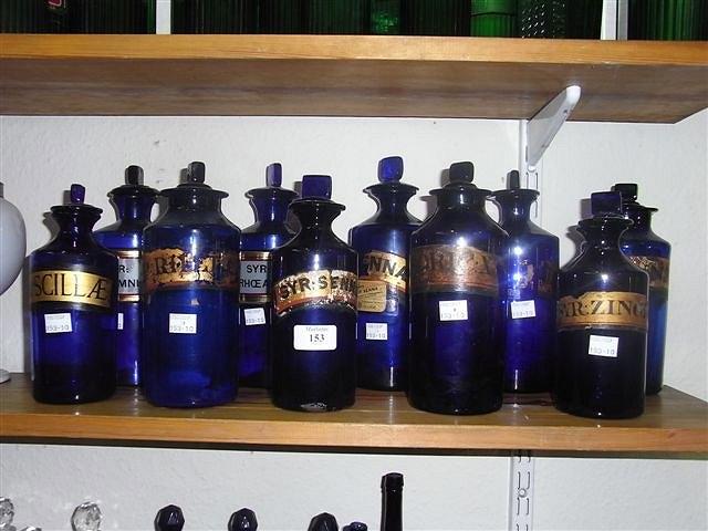 Appraisal: A COLLECTION OF TEN BRISTOL BLUE CHEMISTS JARS to include